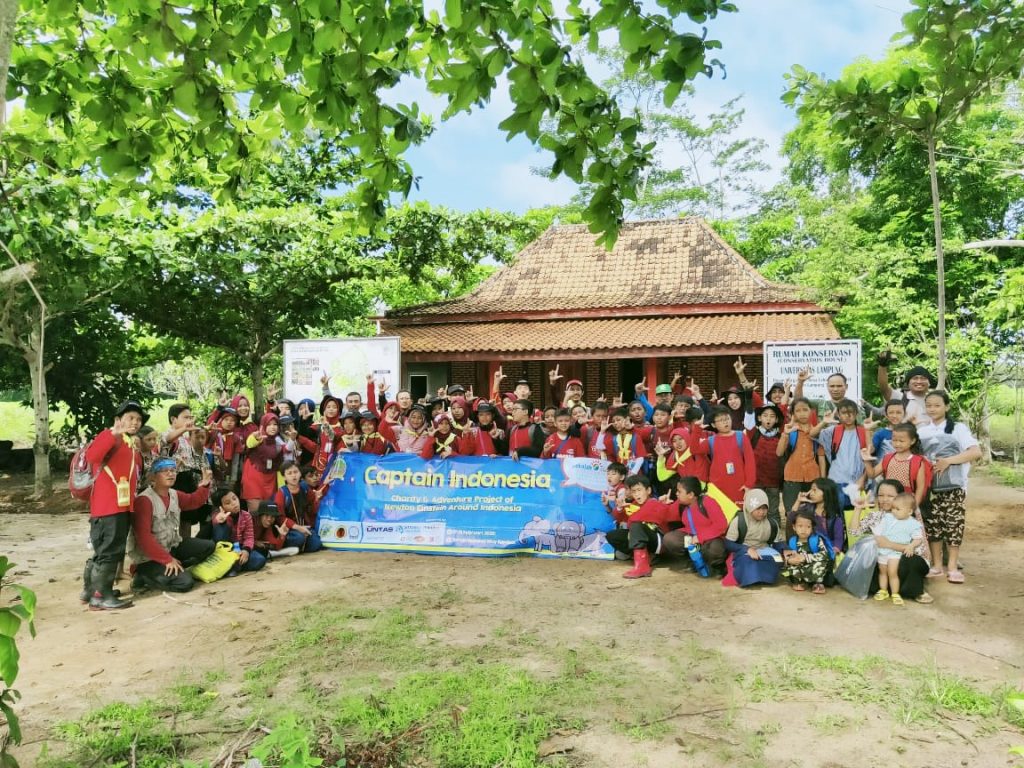 children celebrating their project's success on reforestation 